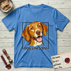 Dog Loves You Vizsla T-Shirt flat lay in Heather Sapphire, featuring Ink and watercolor portrait of a smiling golden rust Vizsla with long silky hanging ears and amber eyes, head tilted inside a black frame above hand-lettered text reading DOG LOVES YOU.