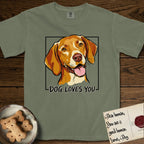 Dog Loves You Vizsla T-Shirt flat lay in Sage, featuring Ink and watercolor portrait of a smiling golden rust Vizsla with long silky hanging ears and amber eyes, head tilted inside a black frame above hand-lettered text reading DOG LOVES YOU.