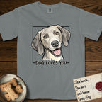 Dog Loves You Weimaraner T-Shirt flat lay in Granite, featuring Ink and watercolor portrait of a smiling silver grey Weimaraner with long velvet hanging ears and pale amber eyes, head tilted inside a black frame above hand-lettered text reading DOG LOVES YOU.