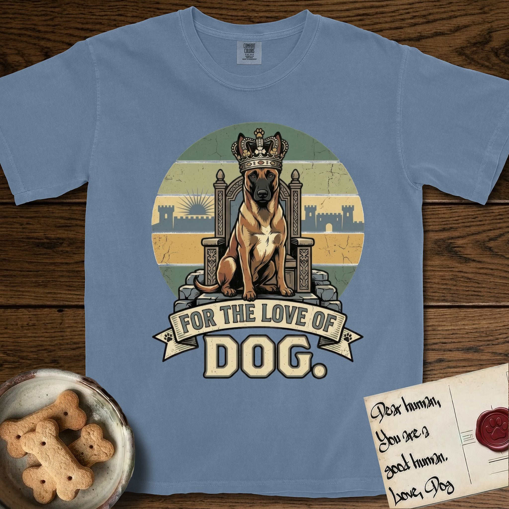For the Love of Dog Belgian Malinois T-Shirt flat lay in Blue Jean, featuring a vintage badge of a crowned Belgian Malinois seated on a throne.