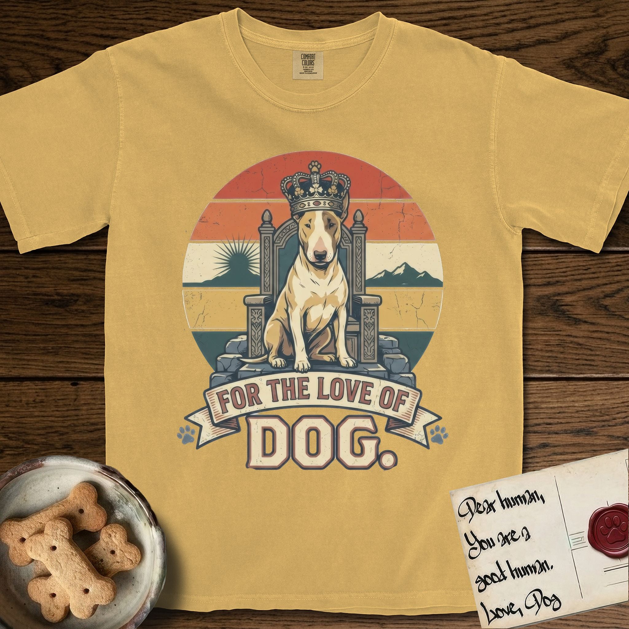 For the Love of Dog Bull Terrier T-Shirt flat lay in Mustard, featuring a vintage badge of a crowned Bull Terrier seated on a throne.