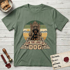For the Love of Dog Dachshund T-Shirt flat lay in Military Green, featuring a vintage badge of a crowned Dachshund seated on a throne.