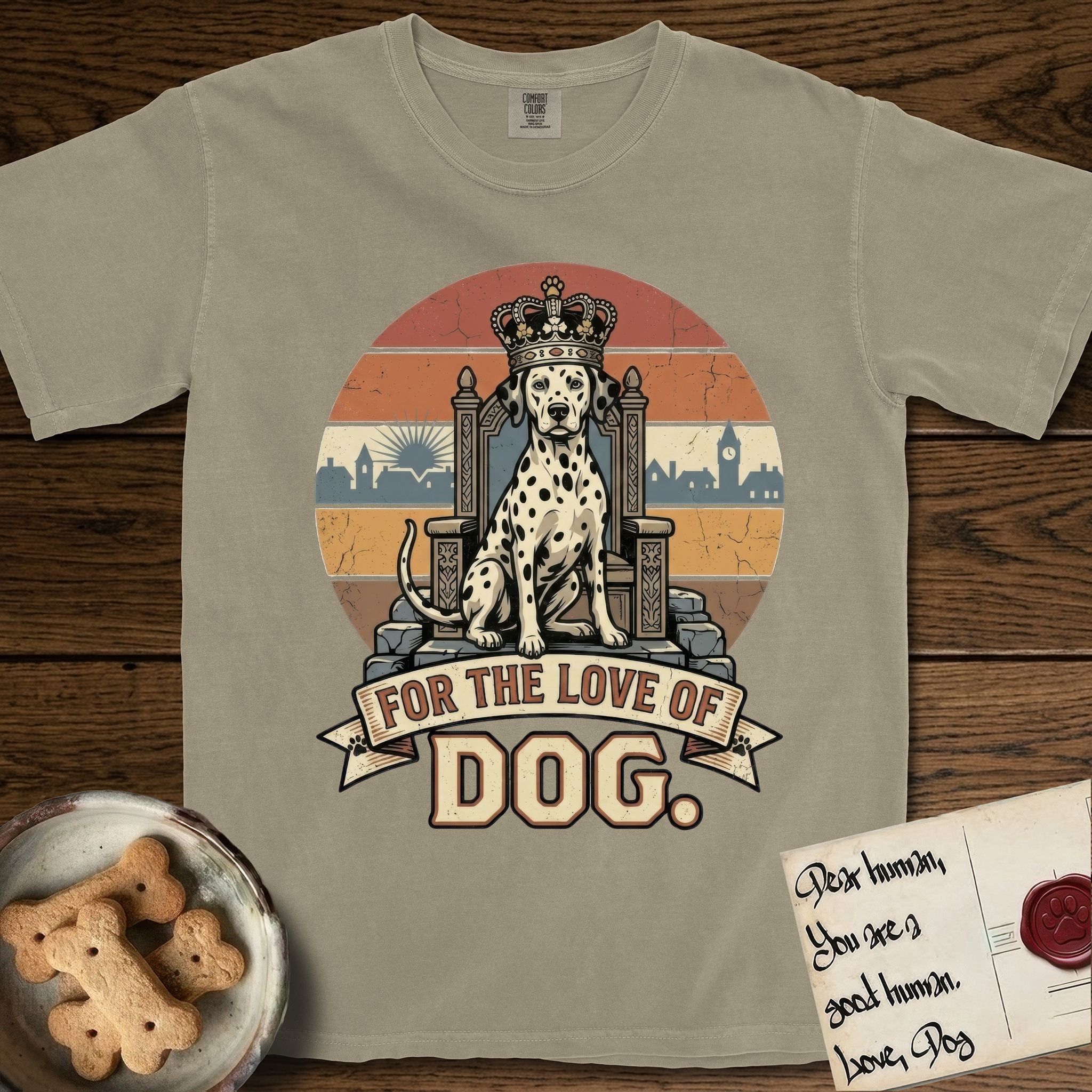 For the Love of Dog Dalmatian T-Shirt flat lay in Khaki, featuring a vintage badge of a crowned Dalmatian seated on a throne.