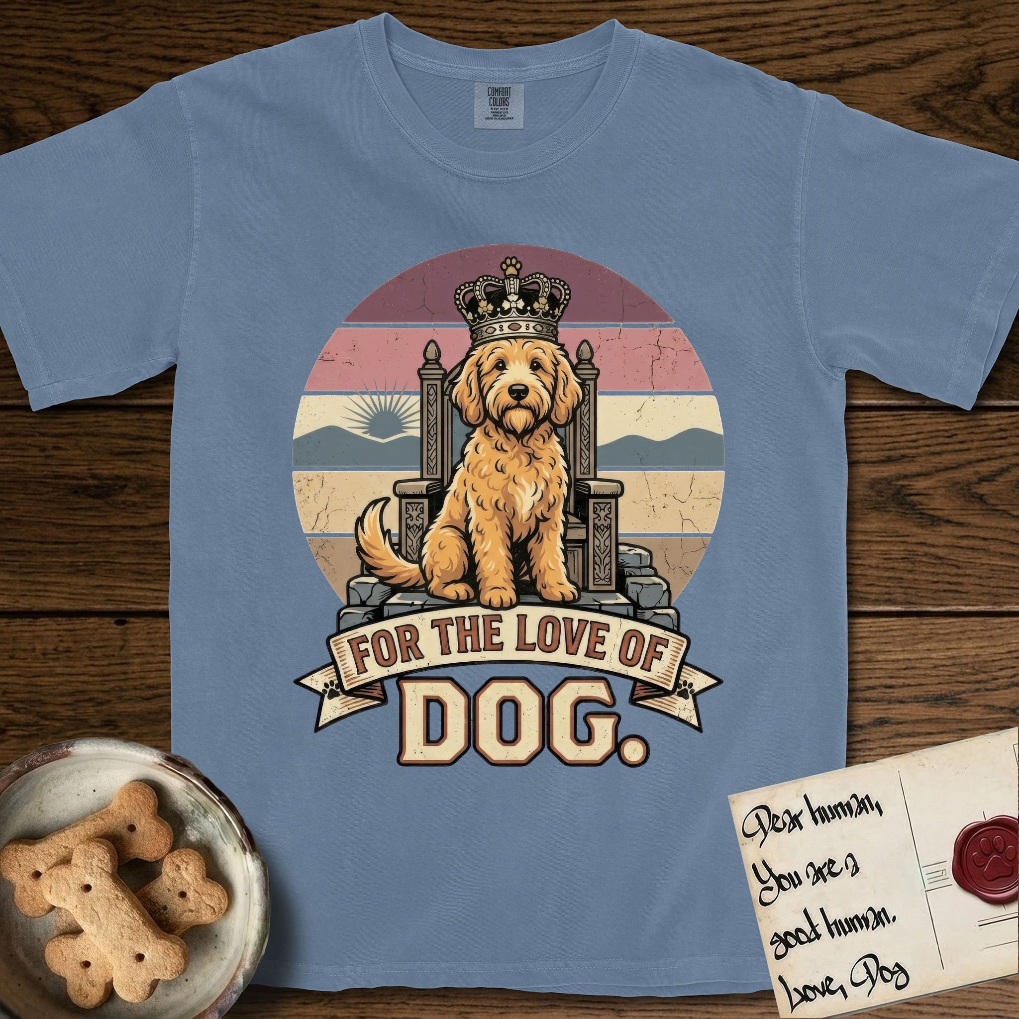 For the Love of Dog Goldendoodle T-Shirt flat lay in Blue Jean, featuring a vintage badge of a crowned Goldendoodle seated on a throne.