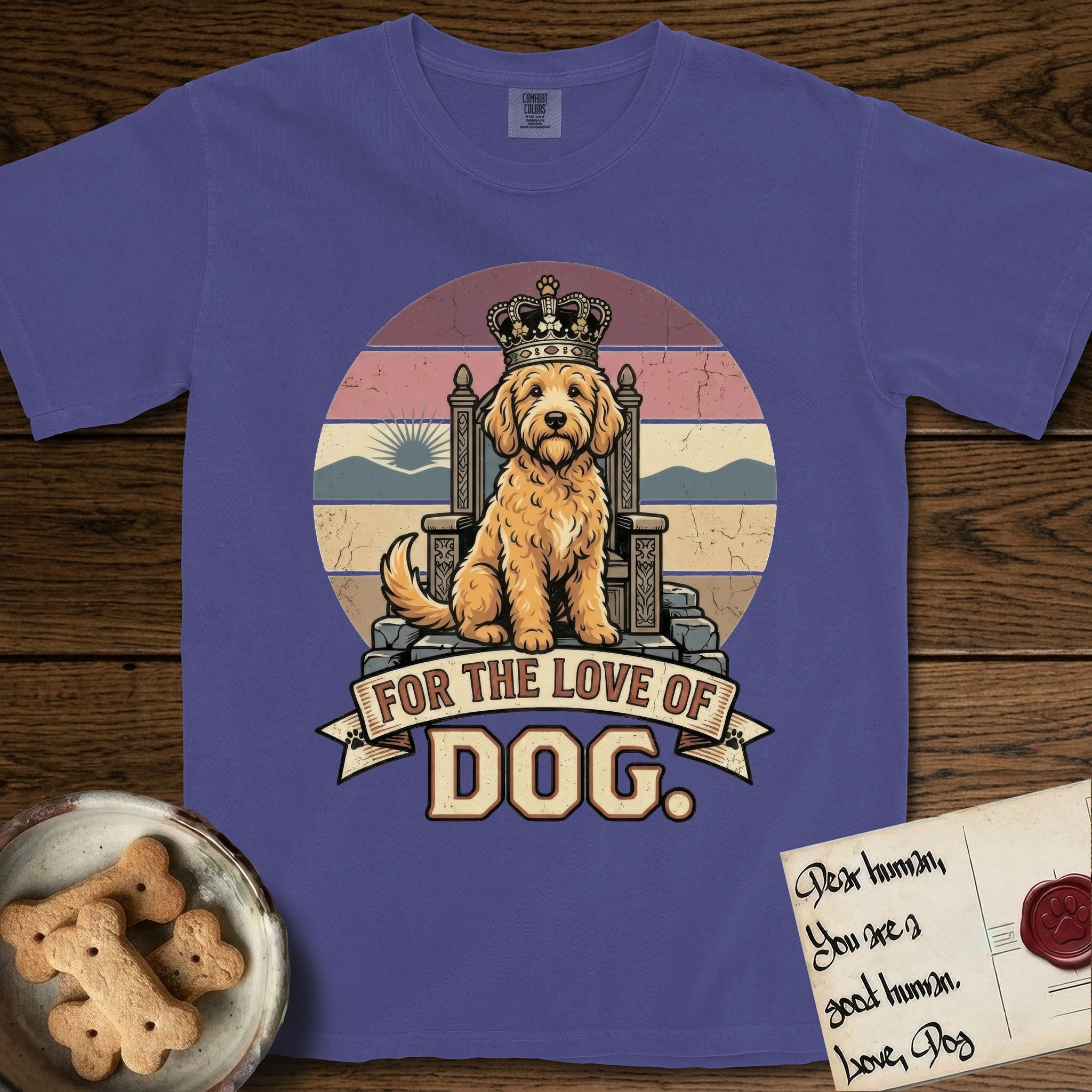 For the Love of Dog Goldendoodle T-Shirt flat lay in Grape, featuring a vintage badge of a crowned Goldendoodle seated on a throne.