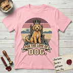 For the Love of Dog Goldendoodle T-Shirt flat lay in Light Pink, featuring a vintage badge of a crowned Goldendoodle seated on a throne.
