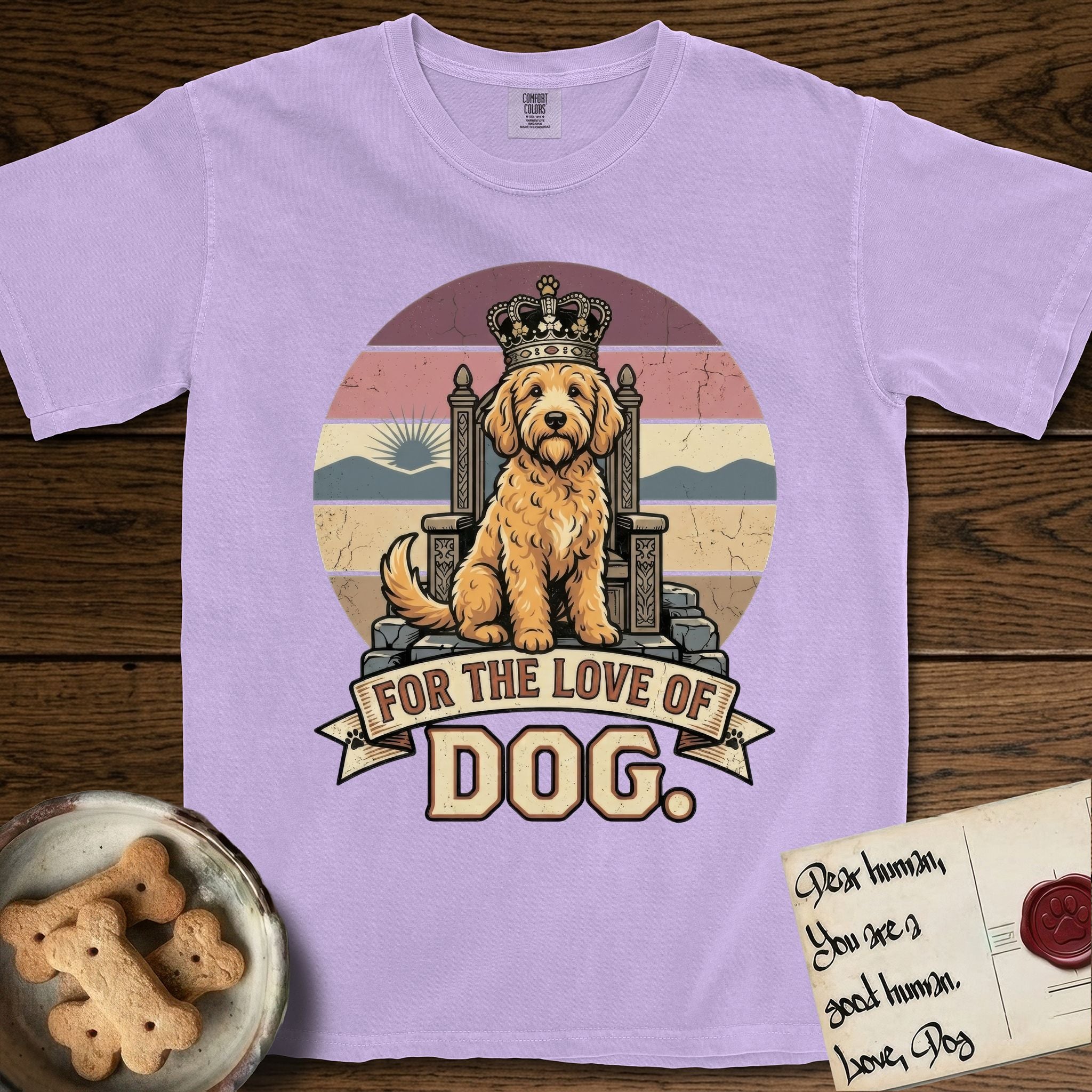For the Love of Dog Goldendoodle T-Shirt flat lay in Orchid, featuring a vintage badge of a crowned Goldendoodle seated on a throne.