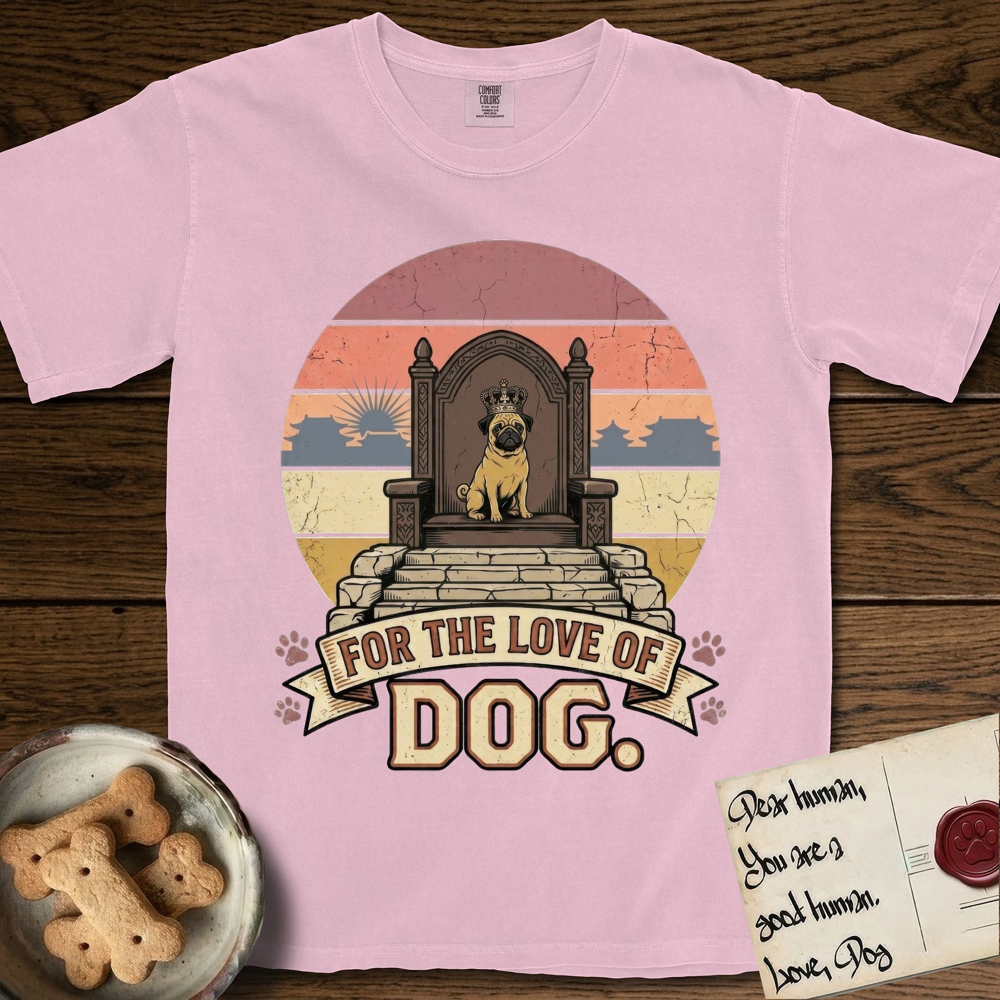 For the Love of Dog Pug T-Shirt flat lay in Blossom, featuring a vintage badge of a crowned Pug seated on a throne.