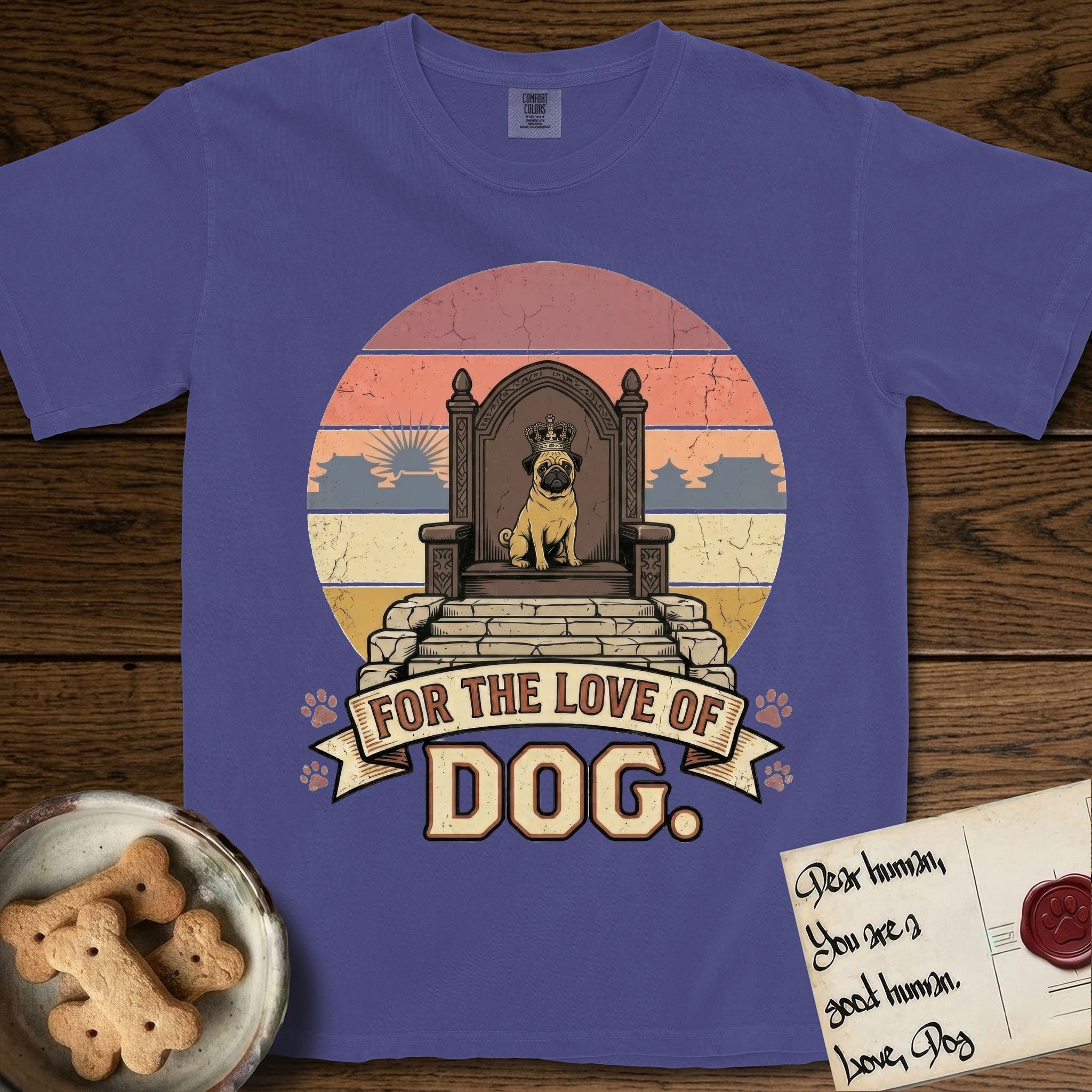 For the Love of Dog Pug T-Shirt flat lay in Grape, featuring a vintage badge of a crowned Pug seated on a throne.