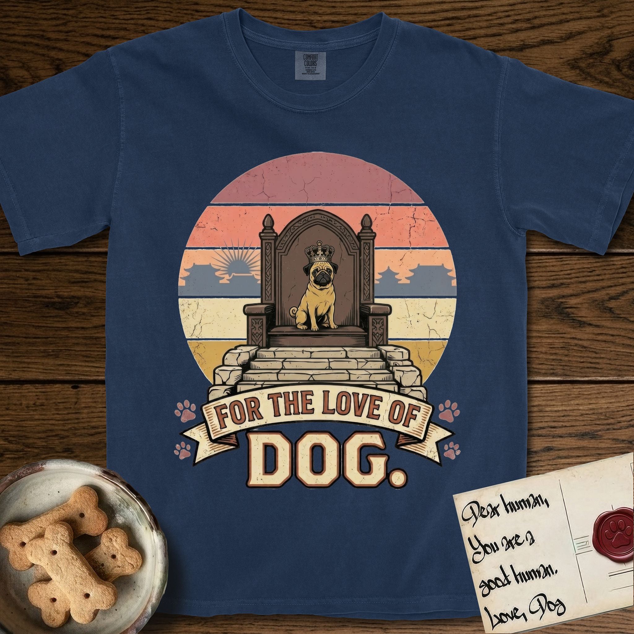 For the Love of Dog Pug T-Shirt flat lay in True Navy, featuring a vintage badge of a crowned Pug seated on a throne.