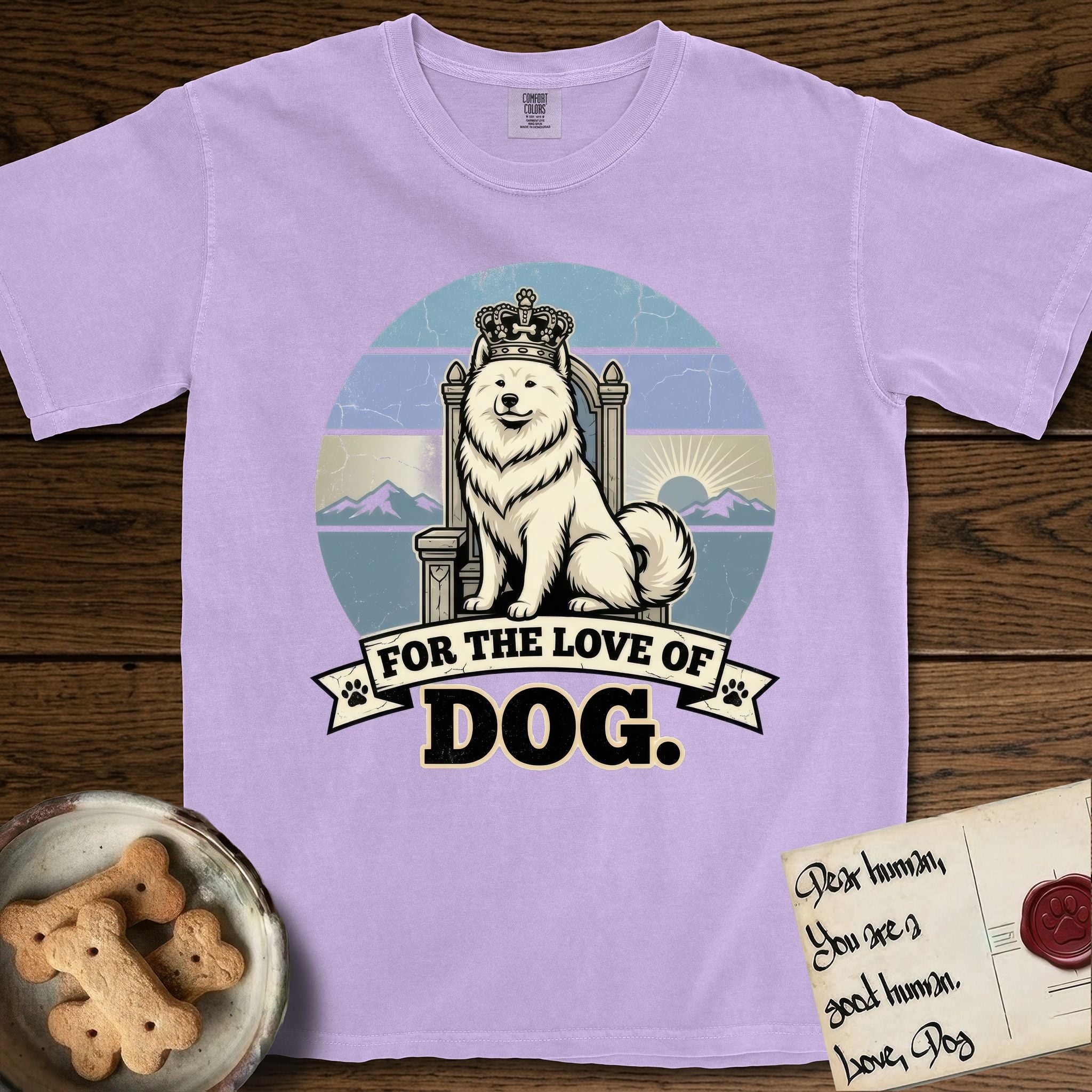 For the Love of Dog Samoyed T-Shirt flat lay in Orchid, featuring a vintage badge of a crowned Samoyed seated on a throne.