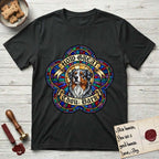How Great Thou Bark Australian Shepherd T-Shirt flat lay in Black, featuring a full-color stained-glass saint window of a blue merle Australian Shepherd with one blue eye and one amber eye, haloed in golden light.