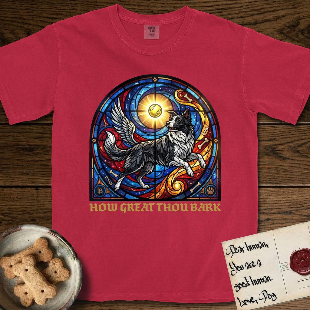 How Great Thou Bark Border Collie T-Shirt flat lay in Red, featuring a full-color stained-glass saint window of a winged Border Collie leaping after a glowing tennis ball, with a halo.