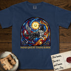 How Great Thou Bark Border Collie T-Shirt flat lay in True Navy, featuring a full-color stained-glass saint window of a winged Border Collie leaping after a glowing tennis ball, with a halo.