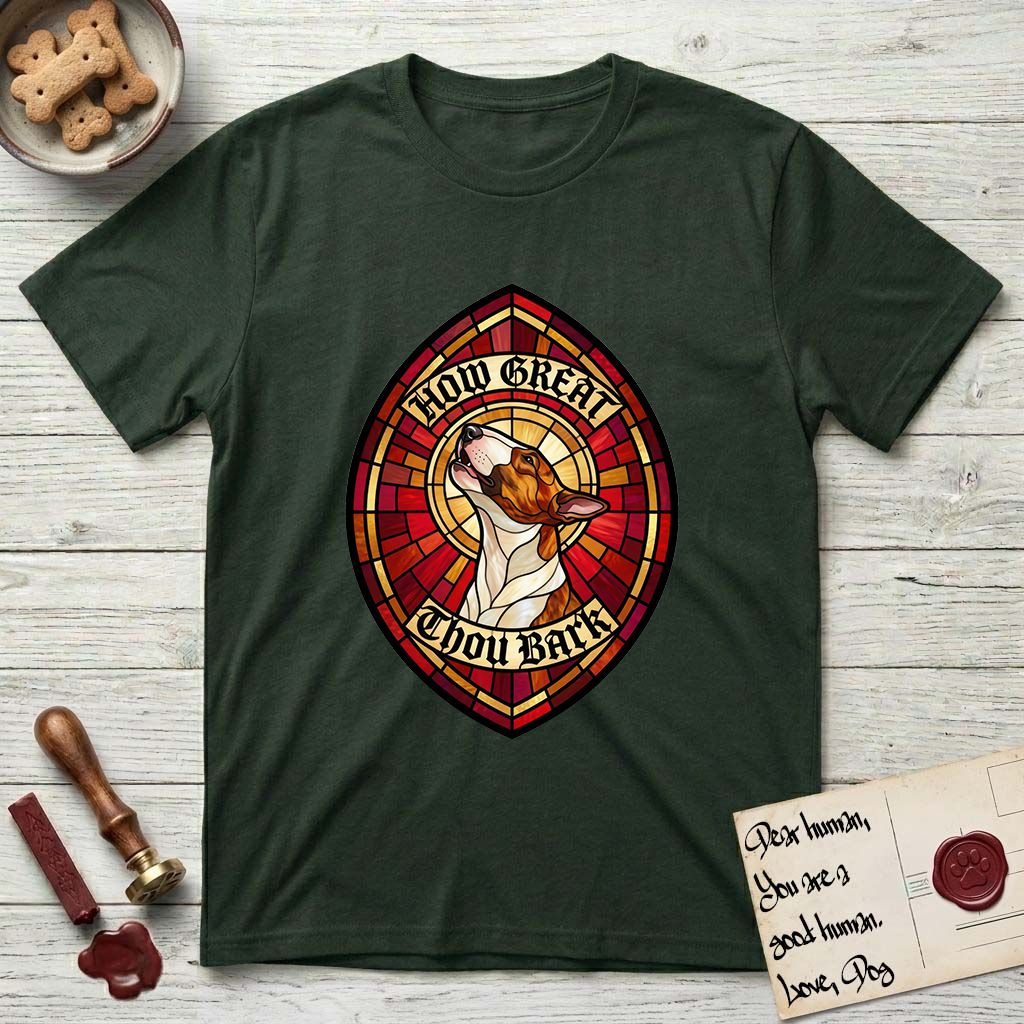 How Great Thou Bark Bull Terrier T-Shirt flat lay in Forest Green, featuring a full-color stained-glass saint window of a brown and white Bull Terrier with head raised and mouth open mid-howl, haloed in golden light.