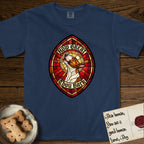 How Great Thou Bark Bull Terrier T-Shirt flat lay in True Navy, featuring a full-color stained-glass saint window of a brown and white Bull Terrier with head raised and mouth open mid-howl, haloed in golden light.