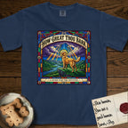 How Great Thou Bark Golden Retriever T-Shirt flat lay in True Navy, featuring a full-color stained-glass saint window of a Golden Retriever standing on a mountain with light breaking through the clouds and a halo.