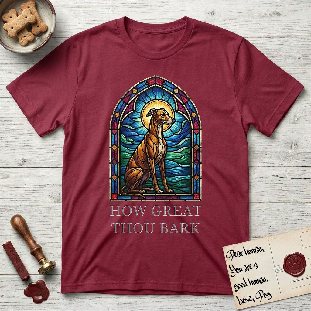 How Great Thou Bark Greyhound T-Shirt flat lay in Cardinal Red, featuring a full-color stained-glass saint window of a Greyhound sitting in stillness, with a halo.