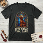 How Great Thou Bark Irish Setter T-Shirt flat lay in Black, featuring a full-color stained-glass saint window of an Irish Setter seated and gazing up into the light, with a halo.
