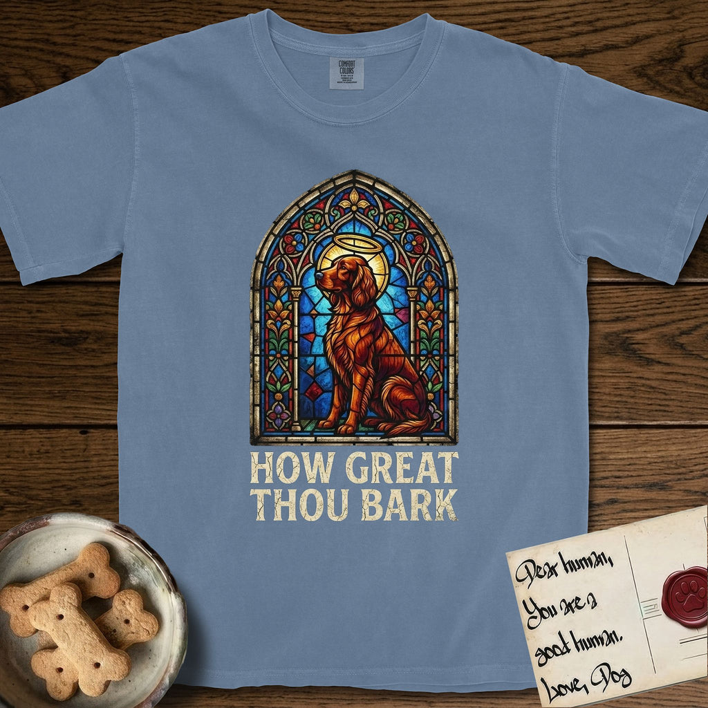 How Great Thou Bark Irish Setter T-Shirt flat lay in Blue Jean, featuring a full-color stained-glass saint window of an Irish Setter seated and gazing up into the light, with a halo.