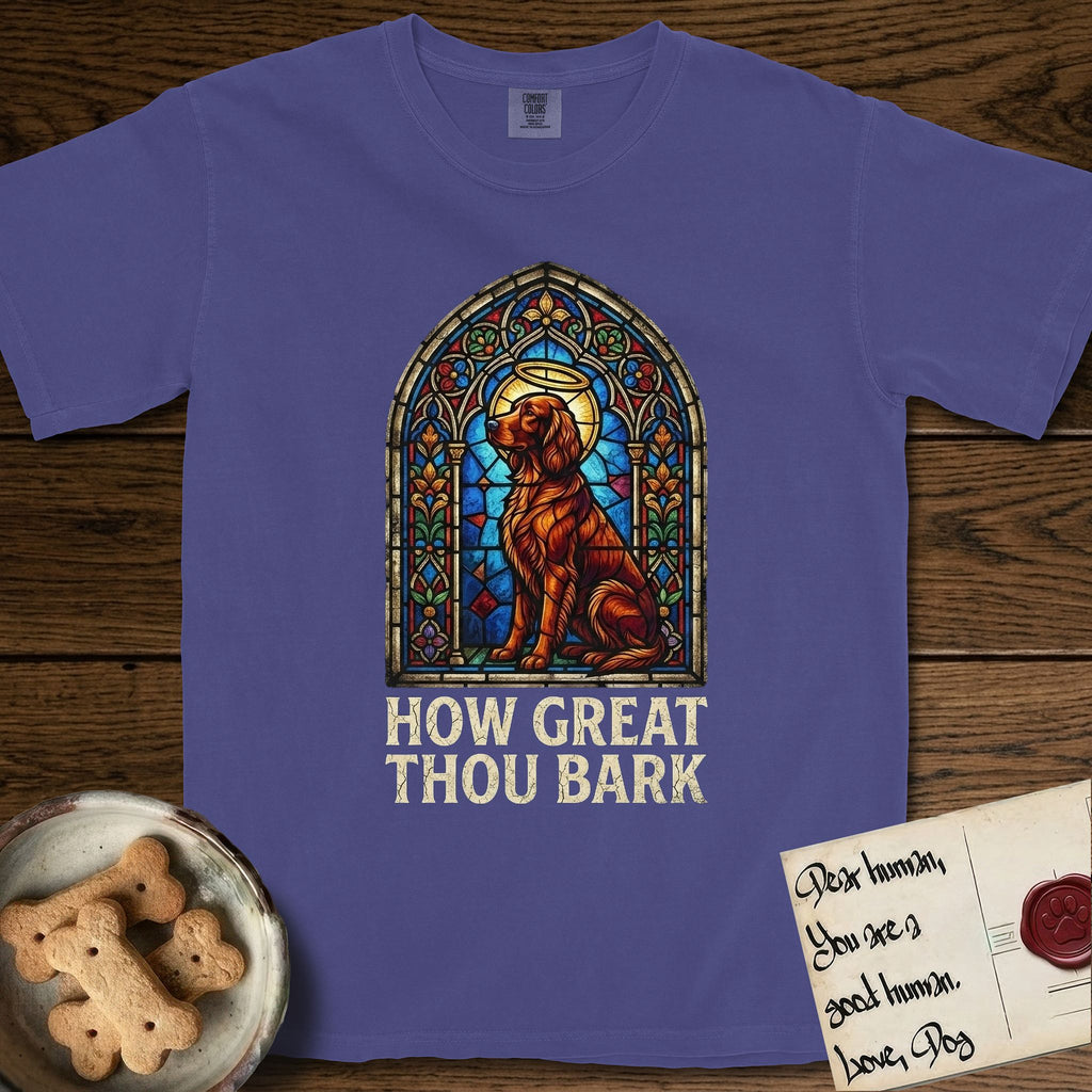 How Great Thou Bark Irish Setter T-Shirt flat lay in Grape, featuring a full-color stained-glass saint window of an Irish Setter seated and gazing up into the light, with a halo.