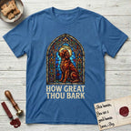 How Great Thou Bark Irish Setter T-Shirt flat lay in Iris, featuring a full-color stained-glass saint window of an Irish Setter seated and gazing up into the light, with a halo.