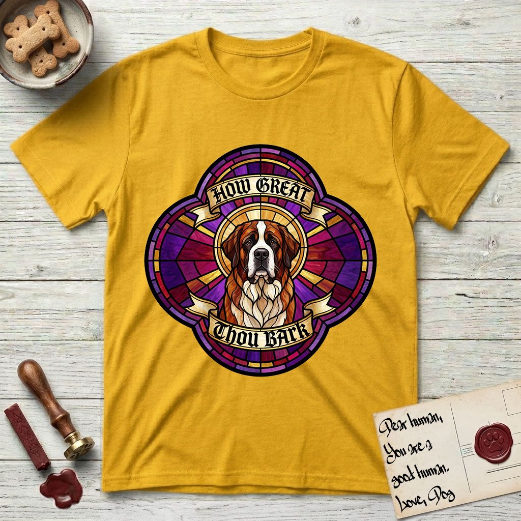 How Great Thou Bark Saint Bernard T-Shirt flat lay in Daisy, featuring a full-color stained-glass saint window of a red and white Saint Bernard facing forward, haloed in golden light.