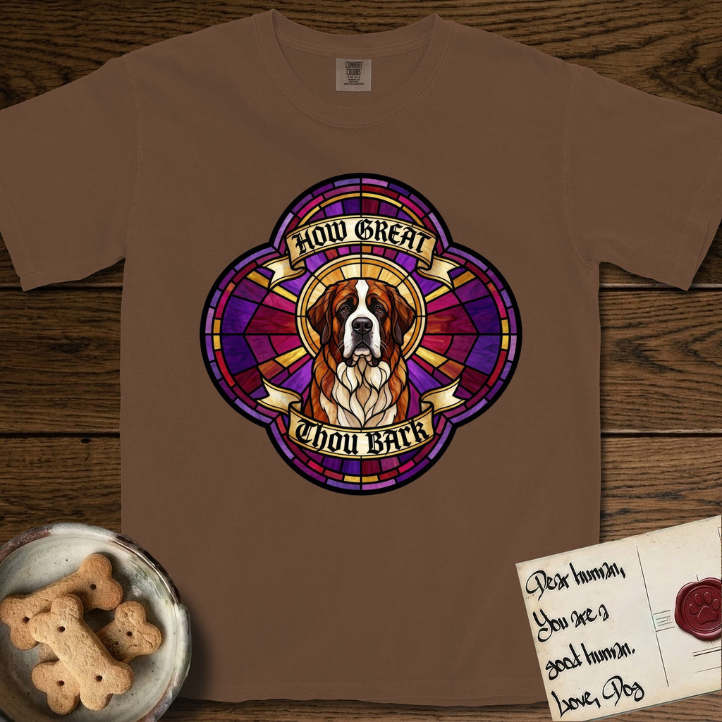 How Great Thou Bark Saint Bernard T-Shirt flat lay in Espresso, featuring a full-color stained-glass saint window of a red and white Saint Bernard facing forward, haloed in golden light.