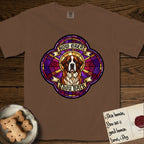 How Great Thou Bark Saint Bernard T-Shirt flat lay in Espresso, featuring a full-color stained-glass saint window of a red and white Saint Bernard facing forward, haloed in golden light.