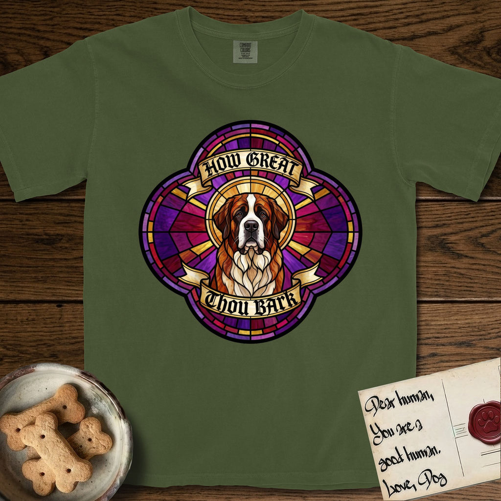 How Great Thou Bark Saint Bernard T-Shirt flat lay in Hemp, featuring a full-color stained-glass saint window of a red and white Saint Bernard facing forward, haloed in golden light.