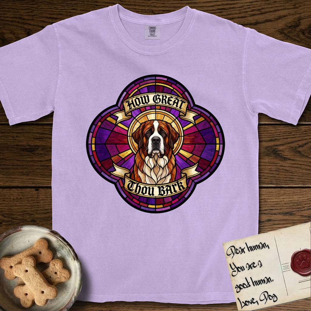 How Great Thou Bark Saint Bernard T-Shirt flat lay in Orchid, featuring a full-color stained-glass saint window of a red and white Saint Bernard facing forward, haloed in golden light.