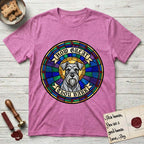How Great Thou Bark Schnauzer T-Shirt flat lay in Heather Berry, featuring a full-color stained-glass saint window of a salt-and-pepper Schnauzer with bushy eyebrows and beard, haloed in golden light.