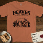 Heaven Isn't a Place Bull Terrier T-Shirt flat lay in Yam, featuring Black ink engraving illustration of a Bull Terrier with a dark patch over one eye asleep on top of the giant carved block letters BULL TERRIER, under the lettering HEAVEN isn't a place..