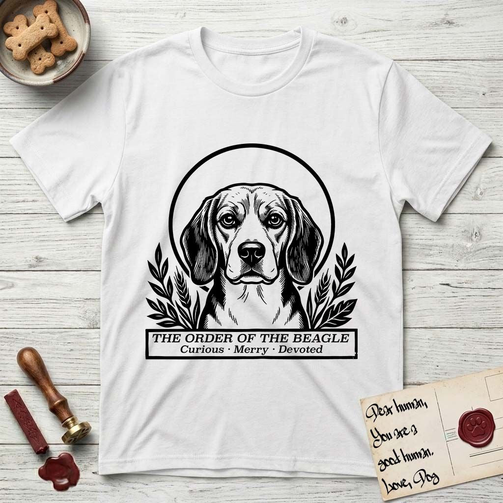 Holy Orders Beagle T-Shirt flat lay in White, featuring a bold black-and-white linocut saint-medallion portrait of a Beagle.