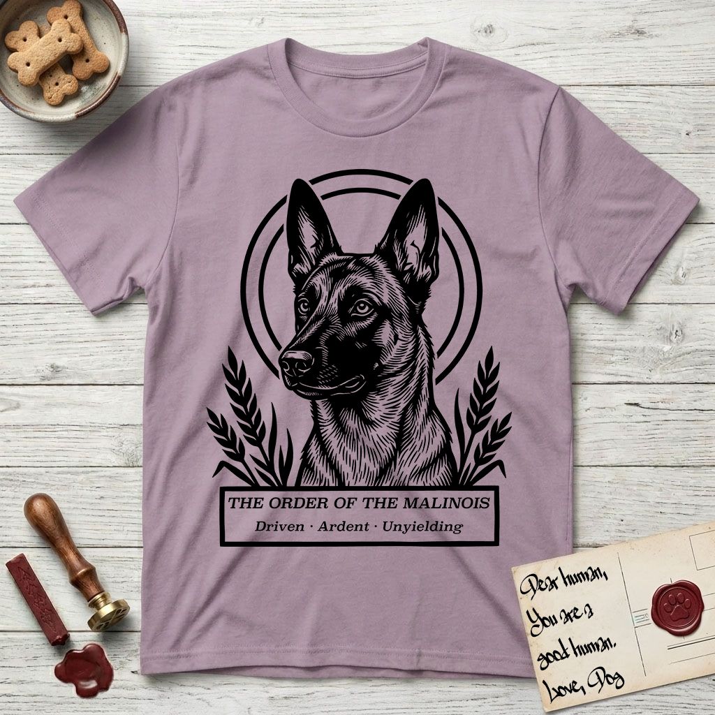 Holy Orders Belgian Malinois T-Shirt flat lay in Paragon, featuring a bold black-and-white linocut saint-medallion portrait of a Belgian Malinois.
