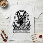 Holy Orders Belgian Malinois T-Shirt flat lay in White, featuring a bold black-and-white linocut saint-medallion portrait of a Belgian Malinois.