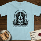 Holy Orders Bernese Mountain Dog T-Shirt flat lay in Chambray, featuring a bold black-and-white linocut saint-medallion portrait of a Bernese Mountain Dog.