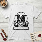 Holy Orders Border Collie T-Shirt flat lay in White, featuring a bold black-and-white linocut saint-medallion portrait of a Border Collie.