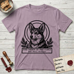 Holy Orders Corgi T-Shirt flat lay in Paragon, featuring a bold black-and-white linocut saint-medallion portrait of a Corgi.