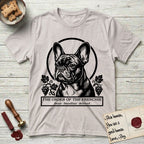 Holy Orders French Bulldog T-Shirt flat lay in Ice Grey, featuring a bold black-and-white linocut saint-medallion portrait of a French Bulldog.