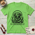 Holy Orders Golden Retriever T-Shirt flat lay in Lime, featuring a bold black-and-white linocut saint-medallion portrait of a Golden Retriever.