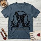 Holy Orders Lobo T-Shirt flat lay in Indigo Blue, featuring a bold black-and-white linocut saint-medallion portrait of Lobo, an Australian Cattle Dog and Pitbull mix with a white facial blaze.