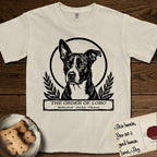 Holy Orders Lobo T-Shirt flat lay in Ivory, featuring a bold black-and-white linocut saint-medallion portrait of Lobo, an Australian Cattle Dog and Pitbull mix with a white facial blaze.