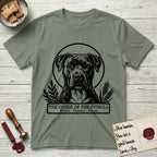 Holy Orders Pitbull T-Shirt flat lay in Sage, featuring a bold black-and-white linocut saint-medallion portrait of a Pitbull.