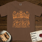 Hallowtide Shar-Pei T-Shirt flat lay in Espresso, featuring Orange one-color gothic illustration of three haloed wrinkled Shar-Peis walking in procession carrying a skeleton key, a scary jack-o'-lantern, and an iron lantern, under the blackletter headline HALLOWTIDE.