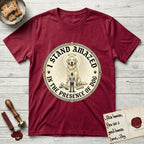 I Stand Amazed in the Presence Golden Retriever T-Shirt flat lay in Antique Cherry Red, featuring a vintage engraving medallion of a haloed Golden Retriever with a small devoted human gazing up from below.
