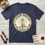 I Stand Amazed in the Presence Golden Retriever T-Shirt flat lay in Navy, featuring a vintage engraving medallion of a haloed Golden Retriever with a small devoted human gazing up from below.