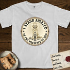 I Stand Amazed in the Presence Golden Retriever T-Shirt flat lay in White, featuring a vintage engraving medallion of a haloed Golden Retriever with a small devoted human gazing up from below.