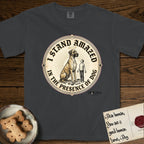 I Stand Amazed in the Presence Great Dane T-Shirt flat lay in Graphite, featuring a vintage engraving medallion of a haloed Great Dane with a small devoted human gazing up from below.