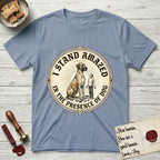 I Stand Amazed in the Presence Great Dane T-Shirt flat lay in Stone Blue, featuring a vintage engraving medallion of a haloed Great Dane with a small devoted human gazing up from below.